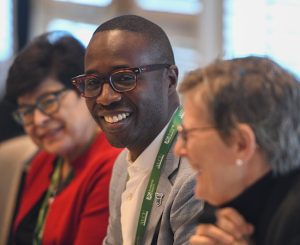 Zulma Toro, Kirk Nooks and Kristen Esterberg meet at 2022 Annual Conference.