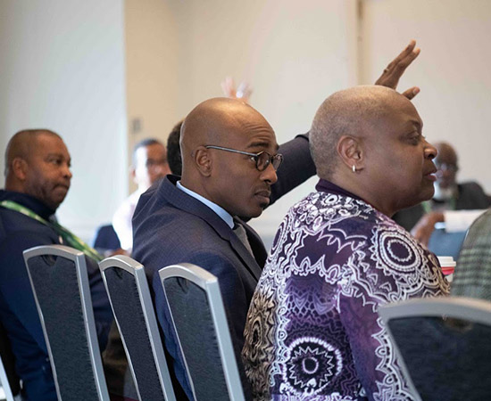 Southern Illinois University Edwardsville’s Chancellor James T. Minor raises a question for the group.